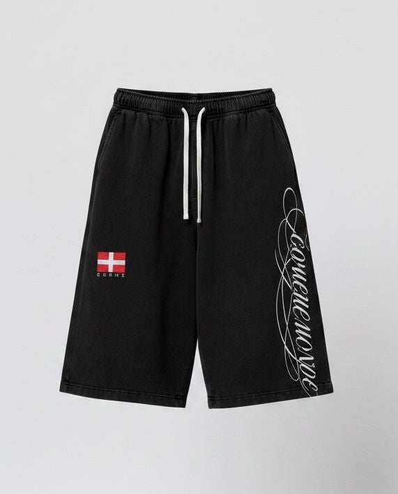COMME SHADY SCRIPT SHORTS